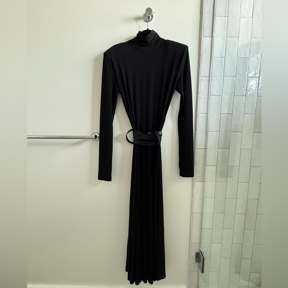 Selling Norma Kamali LS SHOULDER PAD TURTLE FLARED DRESS in Black XS